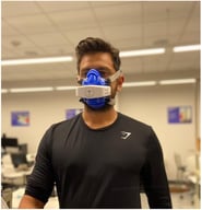 Participant with a wearable metabolic analyzer.