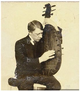 Photographer unknown: Vladimir Tatlin playing the bandura, Moscow, 1911.