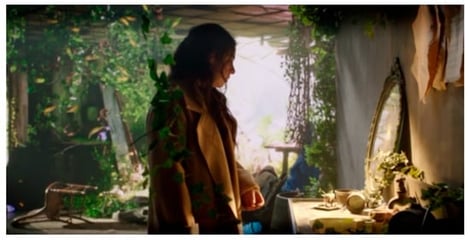 Reflective surfaces fold the LED volume back into the physical performance space, producing a psycho-plastic spatial condition in which physical and digital depth coexist. Performer: Eleni Cassimatis.