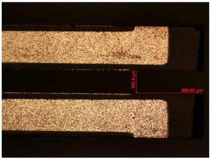 Photograph of a QEPAS QTF taken with an optical microscope.