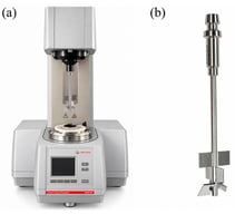 Rheological measurement setup: (a) MCR 102 rheometer; (b) paddle rotor used for rheological measurements.