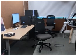 Workshop setup. Participant closest to camera; researcher to their right.