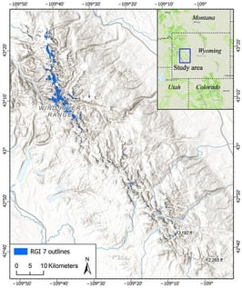 Location of the WRR in Wyoming with RGI 7 (1963–1974) glacier and snowpack outlines. The shaded relief map is the terrain basemap provided in ArcGIS Pro, which was compiled from various data source providers, including Esri, NASA, NSA, NOAA, and USGS (https://www.arcgis.com/home/item.html?id=c61ad8ab017d49e1a82f580ee1298931, accessed on 25 August 2026). The dashed line in the inlet map represents the state boundary and the blue box shows the extent of the study area.